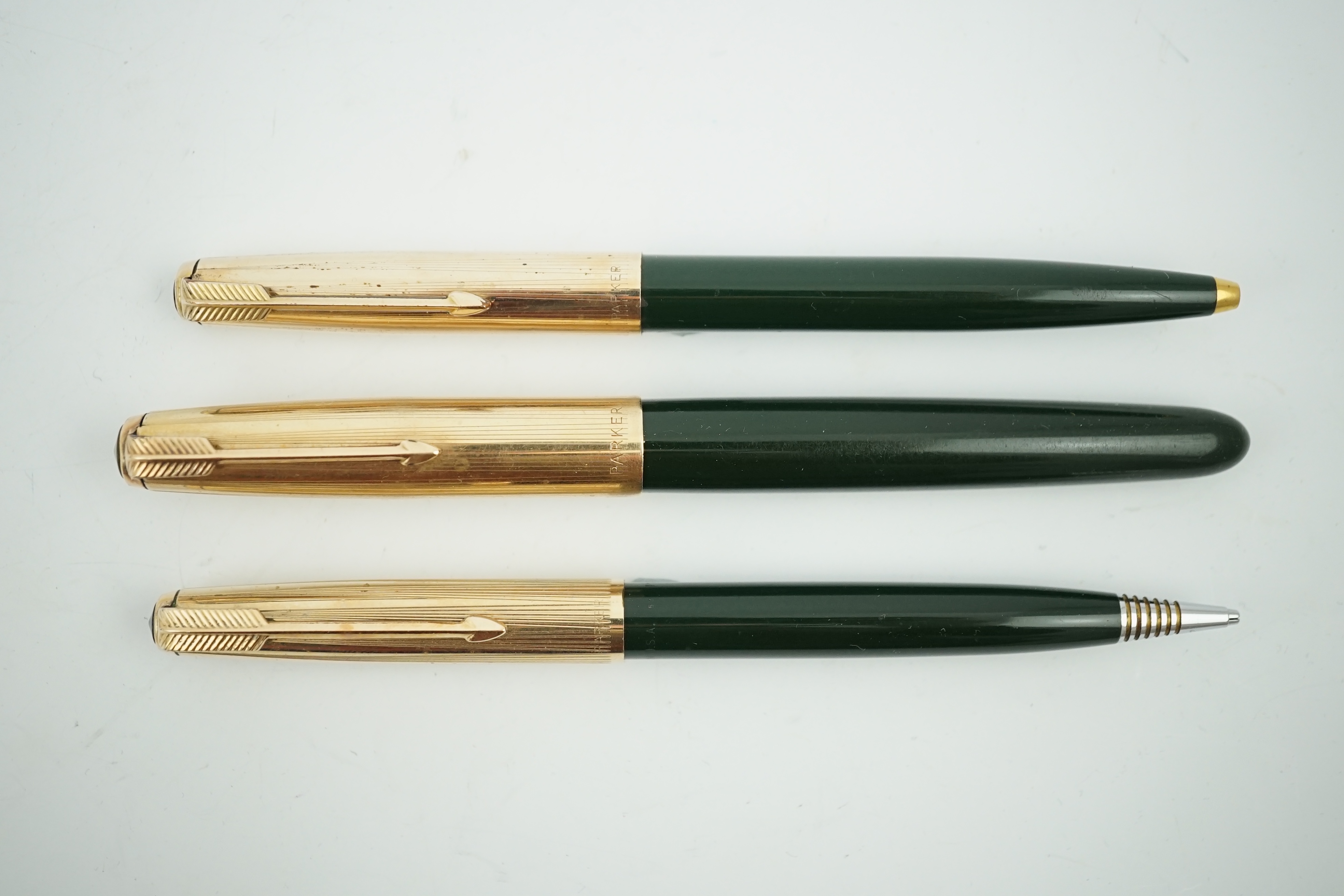 A Parker '51' Aerometric fountain pen, ball pen and pencil set in rare 'Forest Green'